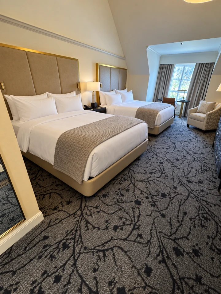 Two-bed guestroom with upholstered headboards during project work at Lafayette Park Hotel & Spa, Lafayette, California