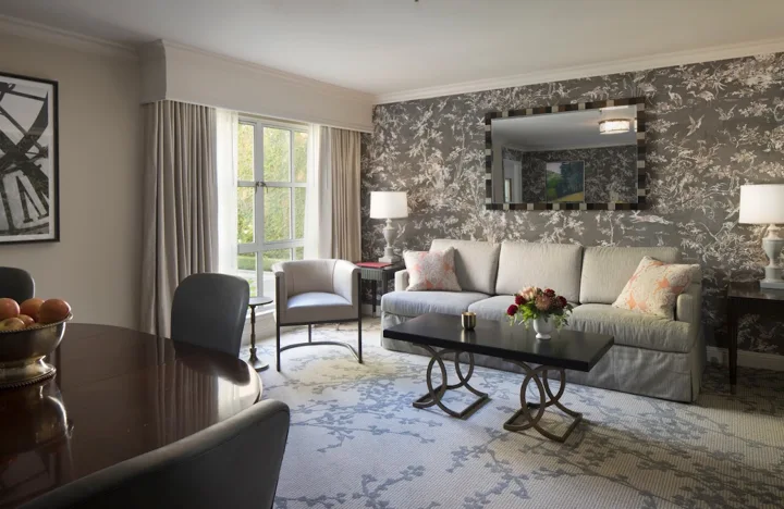 Suite seating area with sofa, armchair and coffee table at Lafayette Park Hotel & Spa, Lafayette, California